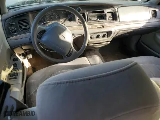 2000 Ford Crown Victoria with VIN 2FAFP73W5YX181565, listed as a Copart auction lot 77098594 with 180,439 mi miles and Salvage Title. Bid and sale history available at carsss.com. Image 8.