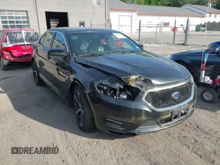 2014 Ford Taurus SHO with VIN 1FAHP2KT5EG136579, listed as a IAAI auction lot 42384706 with 82,514 mi miles and . Bid and sale history available at DreamBid. Image 1.