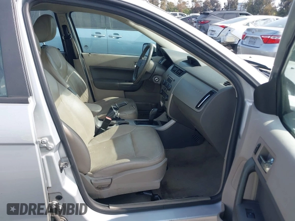 2008 Ford Focus SE with VIN 1FAHP35N98W243888, listed as a IAAI auction lot 42370178 with 141,269 mi miles and . Bid and sale history available at DreamBid. Image 5.