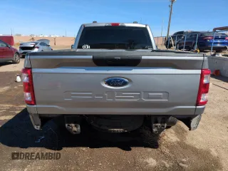 2021 Ford F-150 XL with VIN 1FTMF1C50MKD81601, listed as a Copart auction lot 49331765 with 65,702 mi miles and Salvage title. Bid and sale history available at DreamBid. Image 6.