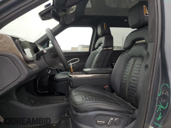 2022 Rivian R1T Launch Edition with VIN 7FCTGAAL7NN002288, listed as a Copart auction lot 43393815 with 46,927 mi miles and Salvage Title. Bid and sale history available at carsss.com. Image 7.
