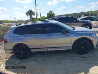 2022 Volkswagen Tiguan SE R-Line Black z VIN 3VV8B7AX3NM168318, wystawiony jako IAAI lot #41530361 z przebiegiem 31 226 mil mil oraz . Historia ofert i sprzedaży dostępna na DreamBid. Obrazek 13.