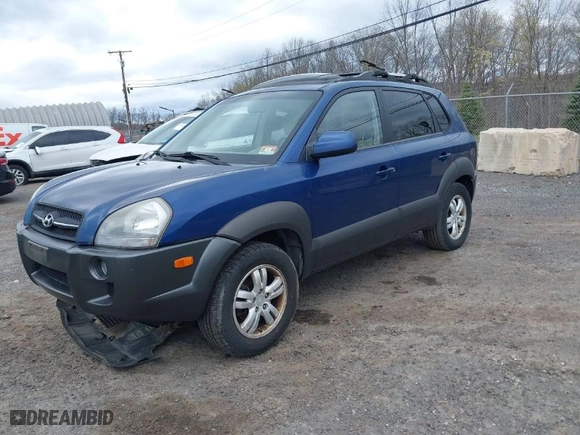 2006 Hyundai Tucson GLS with VIN KM8JN72D06U325677, listed as a IAAI auction lot 42065674 with 168,044 mi miles. Bid and sale history available at carsss.com. Image 2.