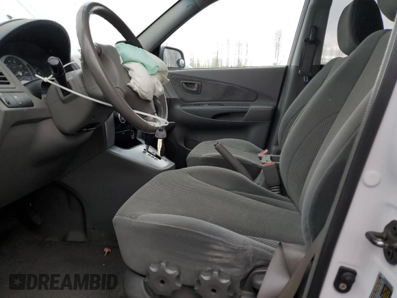 2007 Hyundai Tucson SE with VIN KM8JN12D37U636938, listed as a Copart auction lot 44588235 with 135,131 mi miles and Salvage Title. Bid and sale history available at carsss.com. Image 7.