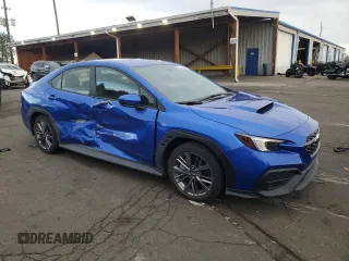 2023 Subaru WRX with VIN JF1VBAA64P9820666, listed as a Copart auction lot 52422165 with 10,726 mi miles and Salvage title. Bid and sale history available at DreamBid. Image 4.