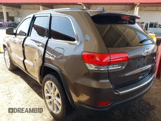 2017 Jeep Grand Cherokee Limited with VIN 1C4RJEBGXHC846920, listed as a IAAI auction lot 41718763 with 131,757 mi miles. Bid and sale history available at carsss.com. Image 3.