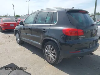 2012 Volkswagen Tiguan SE with VIN WVGAV7AX6CW521960, listed as a IAAI auction lot 42249355 with 118,496 mi miles and . Bid and sale history available at DreamBid. Image 3.