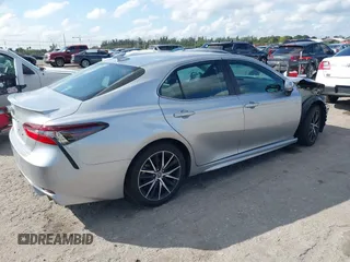 2023 Toyota Camry SE with VIN 4T1G11AK6PU768436, listed as a IAAI auction lot 41485303 with 34,867 mi miles. Bid and sale history available at carsss.com. Image 4.