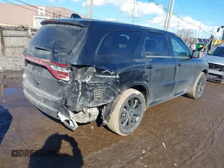 2018 Dodge Durango SXT with VIN 1C4RDJAG3JC156093, listed as a IAAI auction lot 41663072 with 129,792 mi miles and . Bid and sale history available at DreamBid. Image 4.