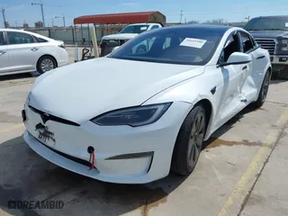 2024 Tesla Model S with VIN 5YJSA1E52RF538021, listed as a IAAI auction lot 41643590 with 15 miles. Bid and sale history available at carsss.com. Image 19.