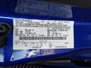 2013 Ford Focus SE with VIN 1FADP3F27DL138703, listed as a IAAI auction lot 41797537 with 128,070 mi miles. Bid and sale history available at carsss.com. Image 9.