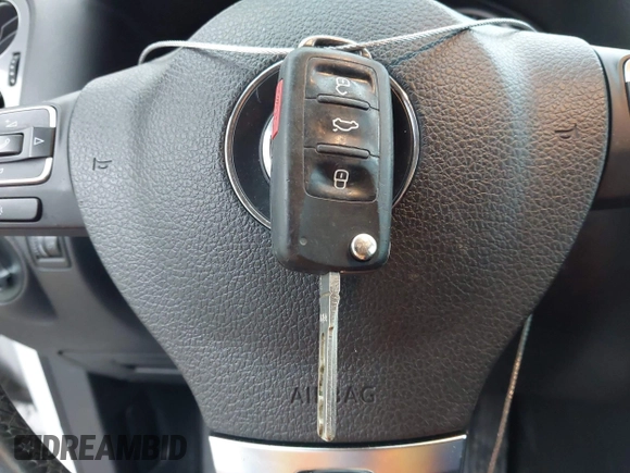 2015 Volkswagen Tiguan R-Line with VIN WVGAV7AX5FW585248, listed as a IAAI auction lot 41909618 with 137,448 mi miles and . Bid and sale history available at DreamBid. Image 11.