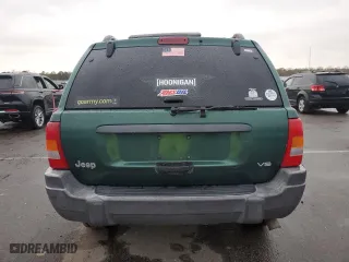 1999 Jeep Grand Cherokee Laredo with VIN 1J4GW58N0XC684111, listed as a Copart auction lot 85944784 with 128,741 mi miles and Salvage Title. Bid and sale history available at carsss.com. Image 6.