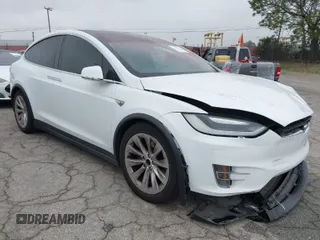 2016 Tesla Model X 70D with VIN 5YJXCBE2XGF013295, listed as a IAAI auction lot 41862736 with 96,190 mi miles. Bid and sale history available at carsss.com. Image 1.