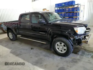2012 Toyota Tacoma PreRunner with VIN 5TFKU4HN1CX002520, listed as a Copart auction lot 47762325 with 184,224 mi miles and Salvage Title. Bid and sale history available at DreamBid. Image 4.