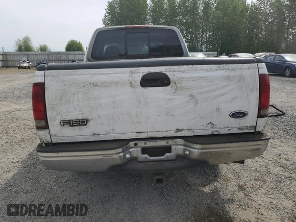 1998 Ford F-150 with VIN 2FTZX1766WCA27840, listed as a Copart auction lot 56186495 with 147,127 mi miles and Clean title. Bid and sale history available at DreamBid. Image 6.