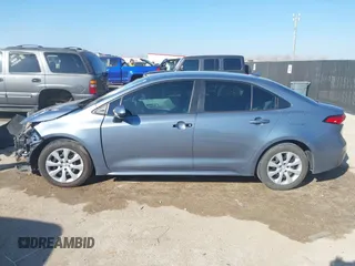 2021 Toyota Corolla LE with VIN 5YFEPMAE2MP174599, listed as a IAAI auction lot 41669966 with 95,791 mi miles and . Bid and sale history available at DreamBid. Image 14.