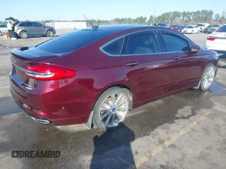 2017 Ford Fusion Titanium with VIN 3FA6P0K96HR137401, listed as a IAAI auction lot 41762567 with 95,958 mi miles. Bid and sale history available at carsss.com. Image 4.