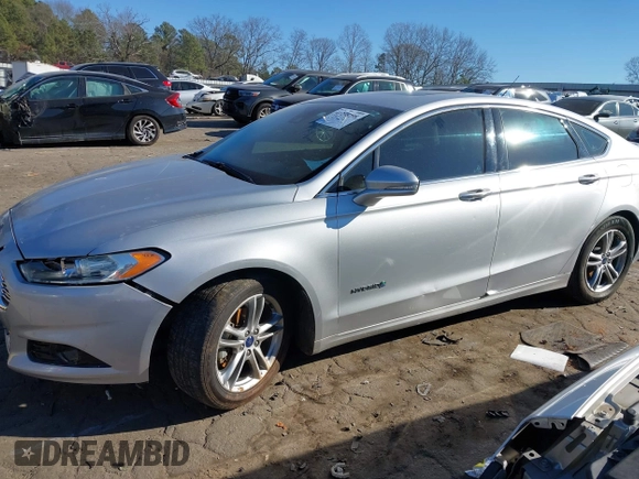 2016 Ford Fusion Titanium Hybrid with VIN 3FA6P0RU7GR364573, listed as a IAAI auction lot 41298298 with 189,900 mi miles. Bid and sale history available at carsss.com. Image 14.