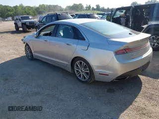 2015 Lincoln MKZ with VIN 3LN6L2G94FR608299, listed as a IAAI auction lot 42103338 with 96,955 mi miles and . Bid and sale history available at DreamBid. Image 3.
