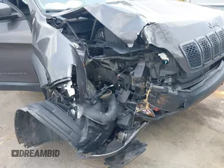 2020 Jeep Cherokee Trailhawk with VIN 1C4PJMBX5LD530720, listed as a IAAI auction lot 42404948 with 99,606 mi miles and . Bid and sale history available at DreamBid. Image 6.