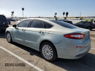 2014 Ford Fusion SE Hybrid with VIN 3FA6P0LU2ER159782, listed as a Copart auction lot 54444274 with 255,212 mi miles and Salvage Title. Bid and sale history available at DreamBid. Image 2.
