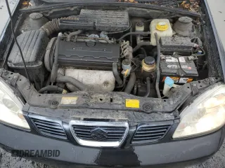 2004 Suzuki Forenza z VIN KL5JJ52Z44K953823, wystawiony jako Copart lot #86589504 z przebiegiem 150 699 mil mil oraz Tytuł czysty. Historia ofert i sprzedaży dostępna na DreamBid. Obrazek 11.