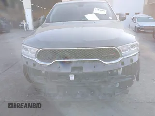 2021 Dodge Durango SXT Plus with VIN 1C4RDJAG5MC523158, listed as a IAAI auction lot 41450801 with 68,496 mi miles and . Bid and sale history available at DreamBid. Image 6.