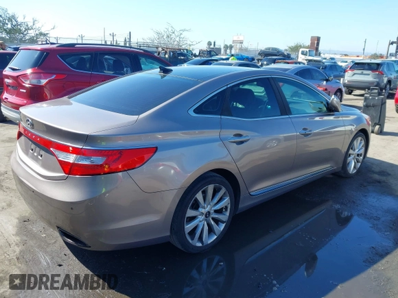 2013 Hyundai Azera with VIN KMHFH4JG2DA256481, listed as a IAAI auction lot 41673405 with 180,130 mi miles and . Bid and sale history available at DreamBid. Image 4.
