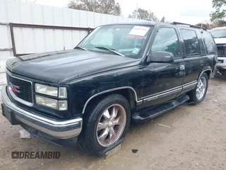 1998 GMC Yukon with VIN 1GKEC13R8WJ711255, listed as a IAAI auction lot 41457304 with 291,211 mi miles. Bid and sale history available at carsss.com. Image 17.