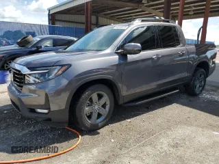 2021 Honda Ridgeline RTL-E z VIN 5FPYK3F71MB016449, wystawiony jako Copart lot #64046975 z przebiegiem 61 052 mil mil oraz Nie do naprawy • Non repairable. Historia ofert i sprzedaży dostępna na DreamBid. Obrazek 1.
