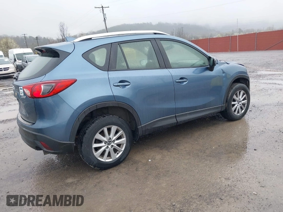 2016 Mazda CX-5 Sport with VIN JM3KE4BY5G0727608, listed as a IAAI auction lot 41975279 with 95,817 mi miles and . Bid and sale history available at carsss.com. Image 4.