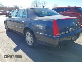 2009 Cadillac DTS 1SA z VIN 1G6KD57Y89U128646, wystawiony jako IAAI lot #40976417 z przebiegiem 167 346 mil mil oraz . Historia ofert i sprzedaży dostępna na DreamBid. Obrazek 3.