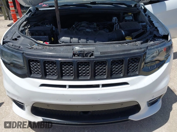 2015 Jeep Grand Cherokee Summit с VIN 1C4RJFJTXFC173287, выставлен на аукционе IAAI как лот 42794100 с пробегом 125 705 миль миль и . История ставок и продаж доступна на DreamBid. Изображение 10.