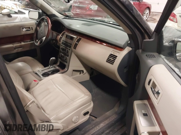 2009 Ford Flex Limited with VIN 2FMDK53C39BA24301, listed as a IAAI auction lot 41120939 with 144,443 mi miles. Bid and sale history available at carsss.com. Image 5.