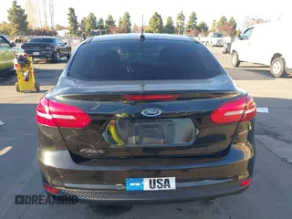 2015 Ford Focus SE with VIN 1FADP3F29FL350473, listed as a IAAI auction lot 41032182 with 102,898 mi miles. Bid and sale history available at carsss.com. Image 16.