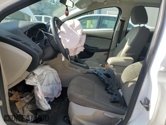 2014 Ford Focus SE z VIN 1FADP3K24EL345833, wystawiony jako Copart lot #57307075 z przebiegiem 158 787 mil mil oraz Szkoda całkowita • Salvage title. Historia ofert i sprzedaży dostępna na DreamBid. Obrazek 7.
