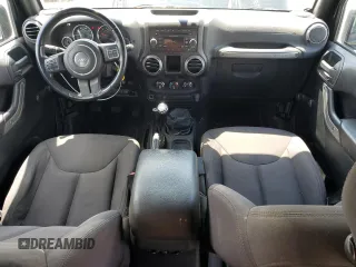 2015 Jeep Wrangler Unlimited Sport with VIN 1C4BJWDG1FL668395, listed as a Copart auction lot 64035035 with 79,972 mi miles and Salvage title. Bid and sale history available at DreamBid. Image 8.