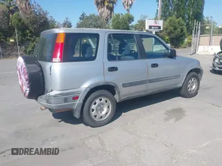 2001 Honda CR-V LX with VIN JHLRD28471S014503, listed as a IAAI auction lot 42229422 with 287,571 mi miles and . Bid and sale history available at DreamBid. Image 4.
