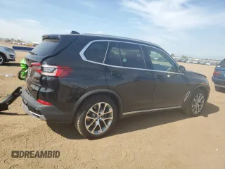 2020 BMW X5 xDrive40i with VIN 5UXCR6C08LLL83222, listed as a Copart auction lot 58377955 with 38,854 mi miles and Salvage title. Bid and sale history available at DreamBid. Image 3.