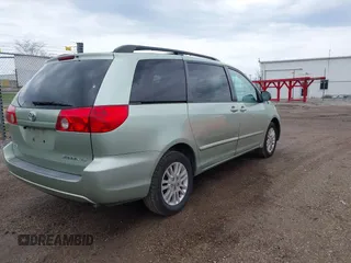 2007 Toyota Sienna CE with VIN 5TDZK23C87S017462, listed as a IAAI auction lot 42113773 with 201,306 mi miles. Bid and sale history available at carsss.com. Image 4.