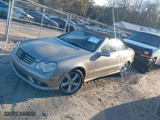 2005 Mercedes-Benz CLK-Class 5.0L with VIN WDBTK75J85F126398, listed as a IAAI auction lot 41890954 with 124,554 mi miles. Bid and sale history available at carsss.com. Image 2.