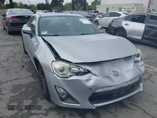 2016 Scion FR-S with VIN JF1ZNAA11G8702268, listed as a IAAI auction lot 41897845 with 133,750 mi miles. Bid and sale history available at carsss.com. Image 1.