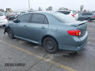 2009 Toyota Corolla with VIN 1NXBU40E49ZO81912, listed as a IAAI auction lot 41806599 with 216,989 mi miles. Bid and sale history available at carsss.com. Image 3.