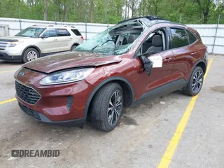 2021 Ford Escape SE Hybrid with VIN 1FMCU9BZ9MUA15592, listed as a IAAI auction lot 42261312 with 56,525 mi miles and . Bid and sale history available at DreamBid. Image 17.