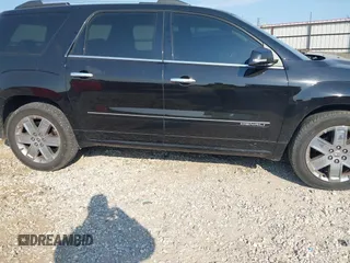 2016 GMC Acadia Denali with VIN 1GKKRTKD0GJ349149, listed as a IAAI auction lot 40554328 with 111,675 mi miles. Bid and sale history available at carsss.com. Image 13.