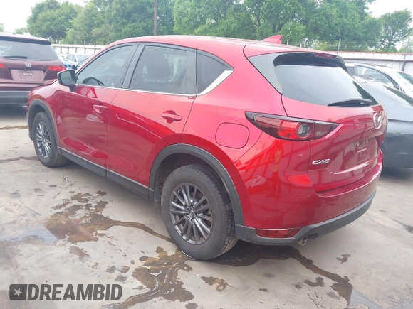 2019 Mazda CX-5 Touring with VIN JM3KFACM7K0696815, listed as a IAAI auction lot 41921763 with 46,900 mi miles. Bid and sale history available at carsss.com. Image 3.