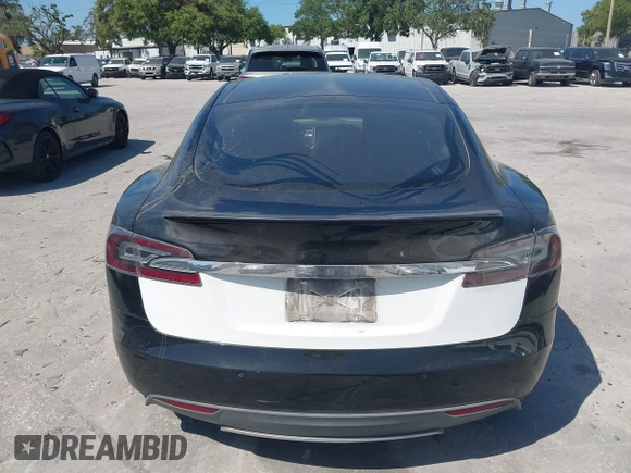 2014 Tesla Model S P85D with VIN 5YJSA1H25EFP65571, listed as a IAAI auction lot 42185442 with 115,990 mi miles and . Bid and sale history available at DreamBid. Image 15.