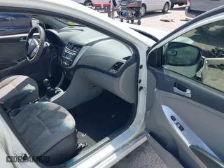 2013 Hyundai Accent GL with VIN KMHCT5AE1DU092600, listed as a IAAI auction lot 41901615 with 126,327 mi miles. Bid and sale history available at carsss.com. Image 5.