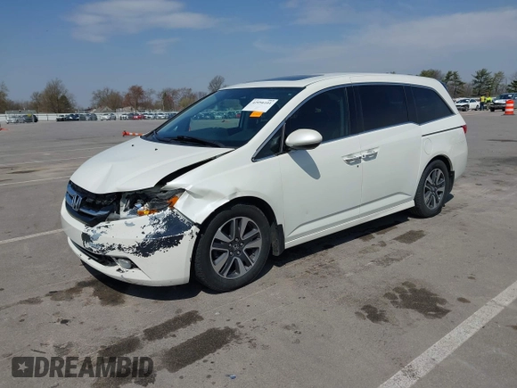 2016 Honda Odyssey Touring Elite with VIN 5FNRL5H97GB044278, listed as a IAAI auction lot 42056101 with 182,396 mi miles and . Bid and sale history available at DreamBid. Image 2.